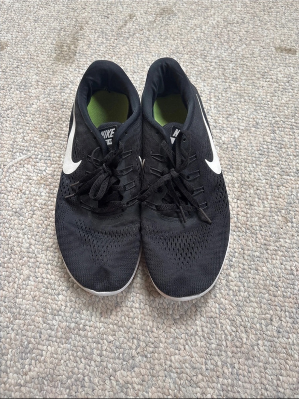 Nike Men’s Black Athletic Shoes with White Swoosh and Green Insole